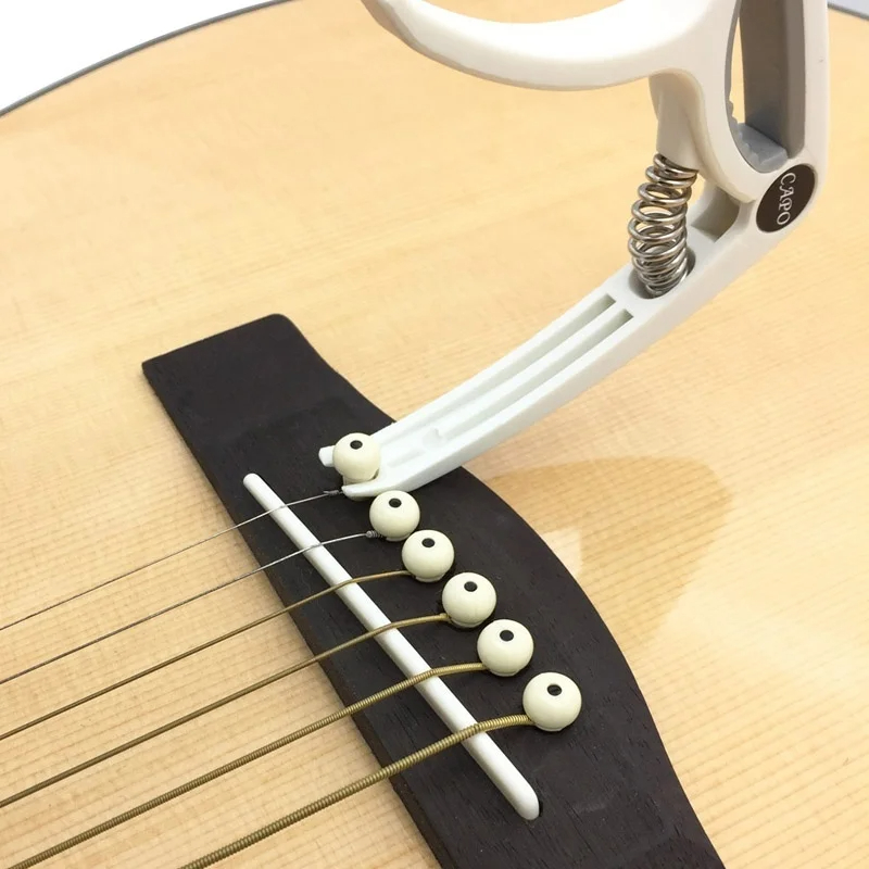 Plastic Guitar Capo for 6 Stri - đánh giá và giá Musical Instrument Gif