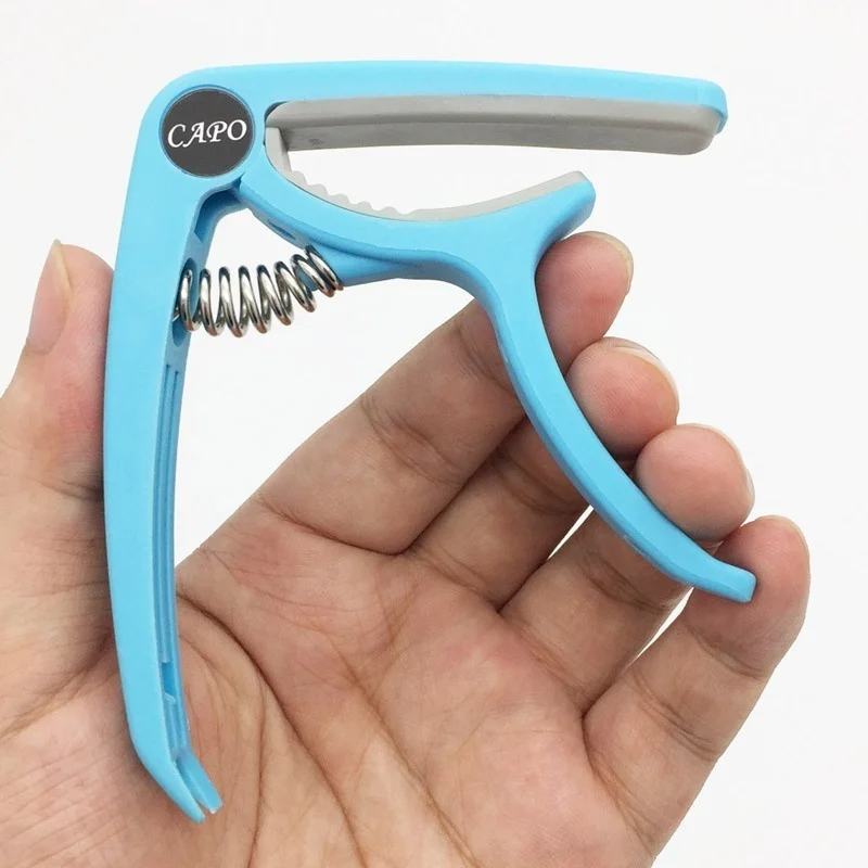 Plastic Guitar Capo for 6 Stri - đánh giá và giá Musical Instrument Gif